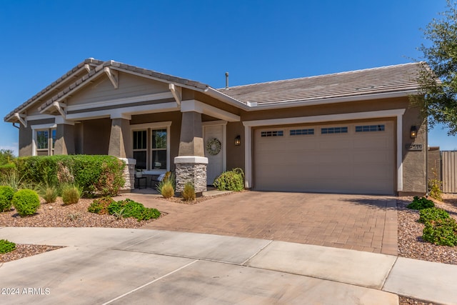 view of front of property featuring a garage