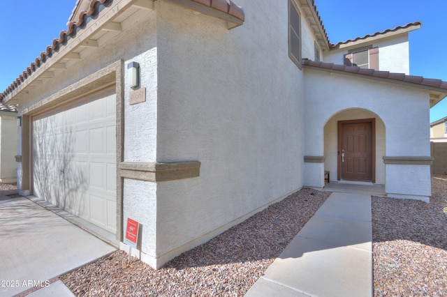 entrance to property with a garage