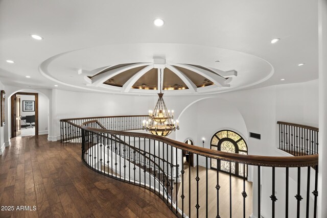 6852 E Fanfol Dr, Paradise Valley, AZ 85253 - hall with recessed lighting, an inviting chandelier, visible vents, an upstairs landing, and arched walkways