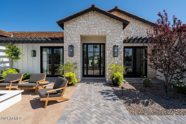 entrance to property with french doors