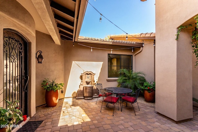 view of patio with outdoor dining area