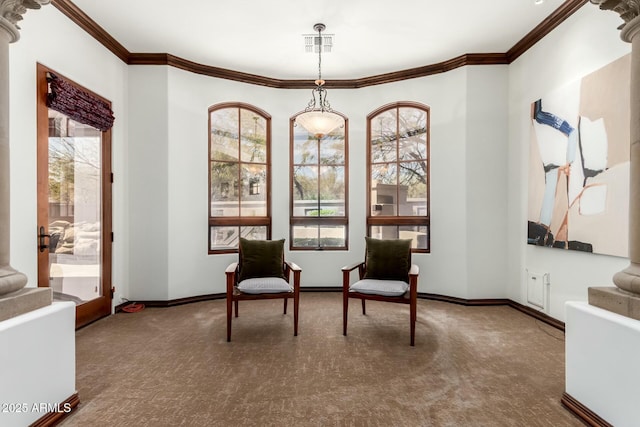 living area featuring carpet floors, visible vents, baseboards, and crown molding