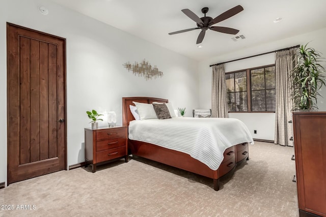 bedroom featuring carpet floors, ceiling fan, and visible vents