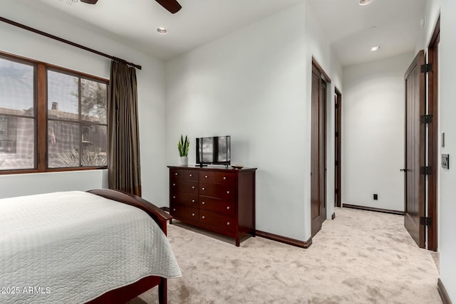 bedroom with a ceiling fan, recessed lighting, light carpet, and baseboards