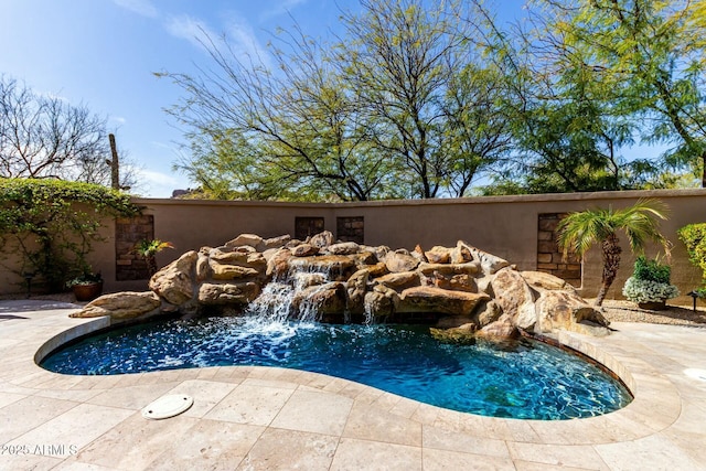 view of pool with a patio area