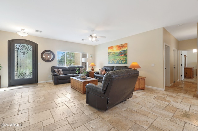 living room featuring ceiling fan