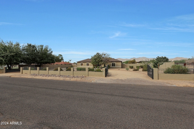 view of front facade featuring a mountain view