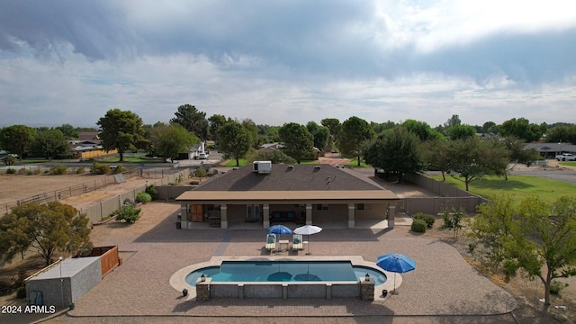 view of swimming pool featuring a patio area