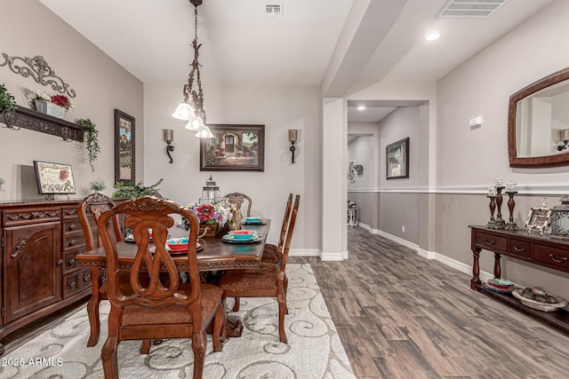 dining area with recessed lighting, visible vents, baseboards, and wood finished floors