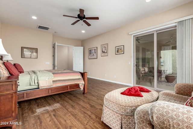 bedroom featuring ceiling fan, dark hardwood / wood-style floors, and access to exterior