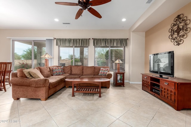 living room featuring ceiling fan and light tile patterned floors