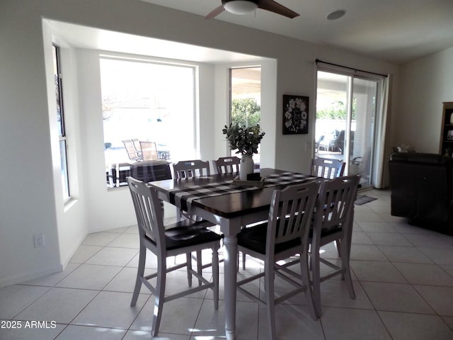 dining room with light tile patterned flooring