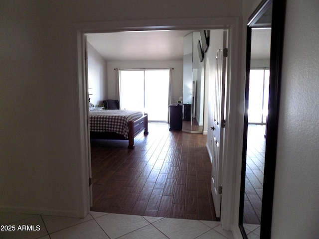 bedroom with tile patterned floors