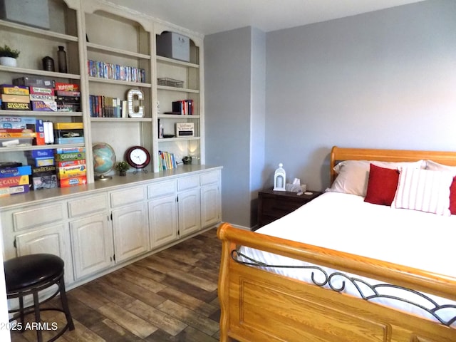 bedroom featuring dark wood-type flooring