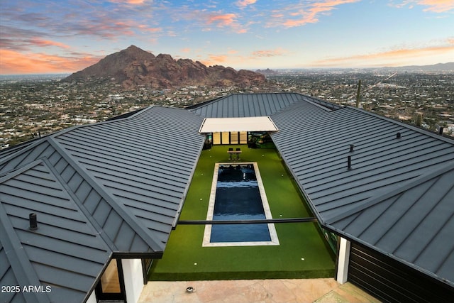 aerial view at dusk with a mountain view