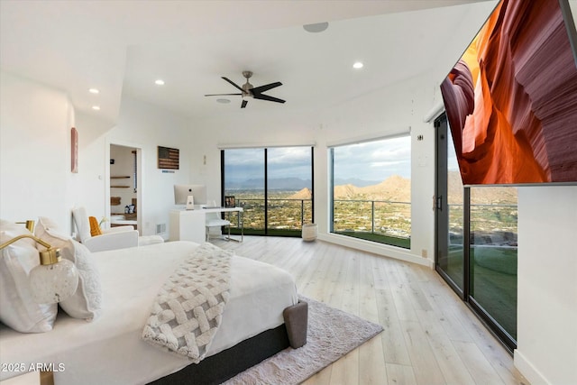 bedroom featuring recessed lighting, hardwood / wood-style flooring, baseboards, and access to outside