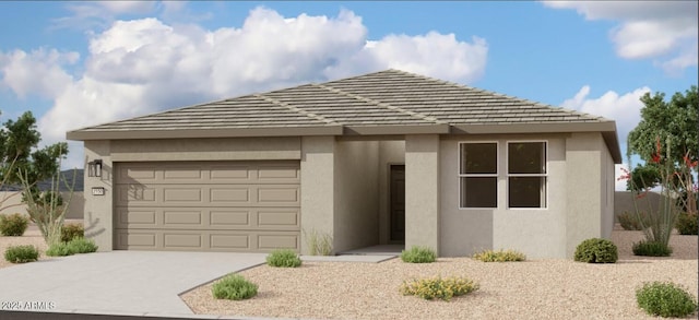 view of front facade with driveway, an attached garage, and stucco siding