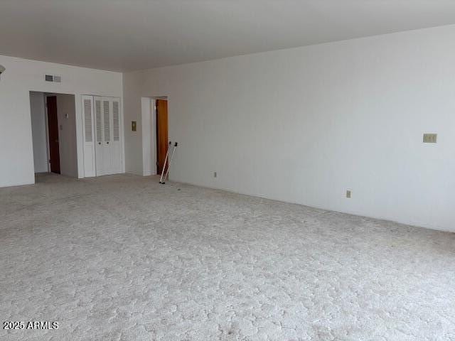 empty room featuring carpet floors
