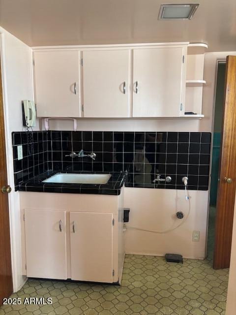 washroom featuring a sink