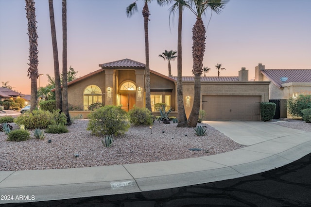 view of front of home featuring a garage