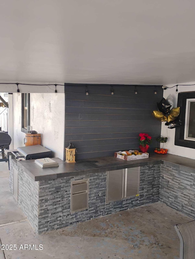 view of patio / terrace featuring an outdoor kitchen