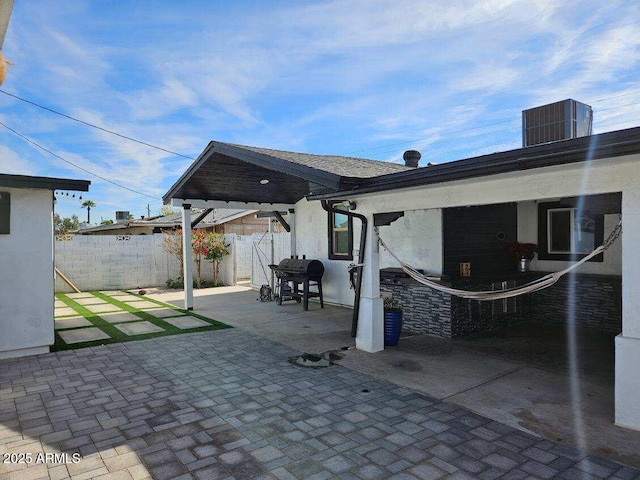 view of patio / terrace with central AC unit