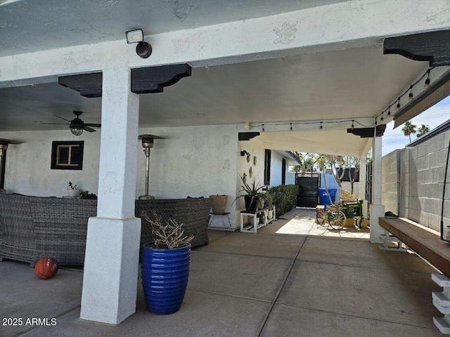 view of patio / terrace featuring ceiling fan