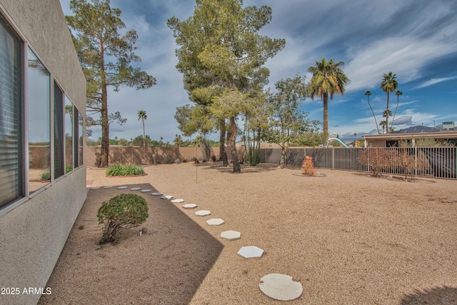 view of yard featuring a fenced backyard