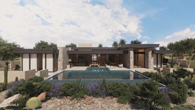 back of property featuring stone siding, a patio area, an infinity pool, and stucco siding