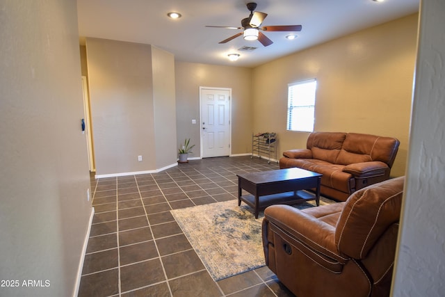 tiled living room with ceiling fan