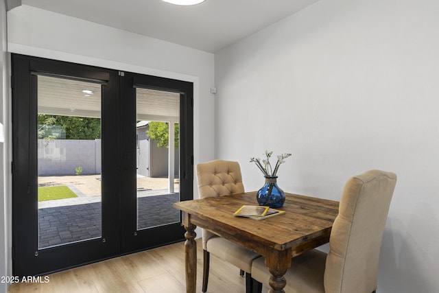6723 E 1st Ave, Scottsdale, AZ 85251 - dining room with light wood-style floors and french doors