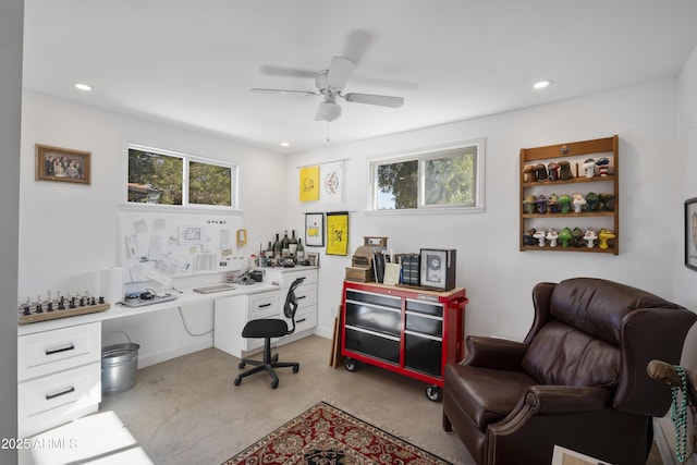 office featuring built in desk and ceiling fan