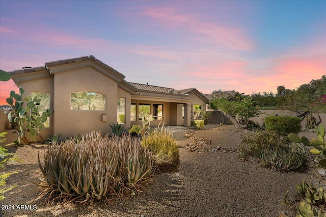 view of front of home featuring a patio area