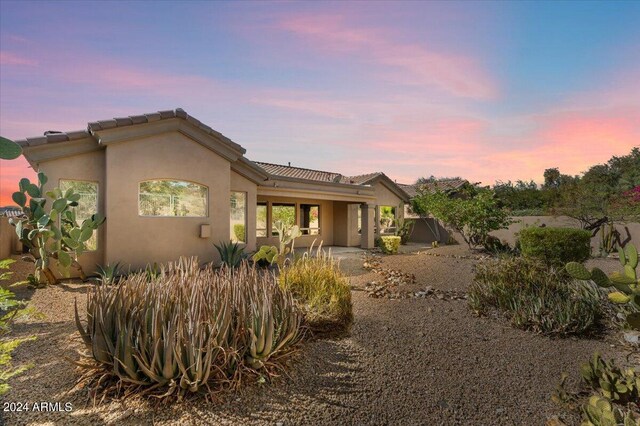 15120 E Vermillion Dr, Fountain Hills, AZ 85268 - rear view of property featuring a patio area, stucco siding, and a tile roof