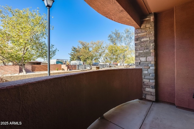 view of patio with a balcony