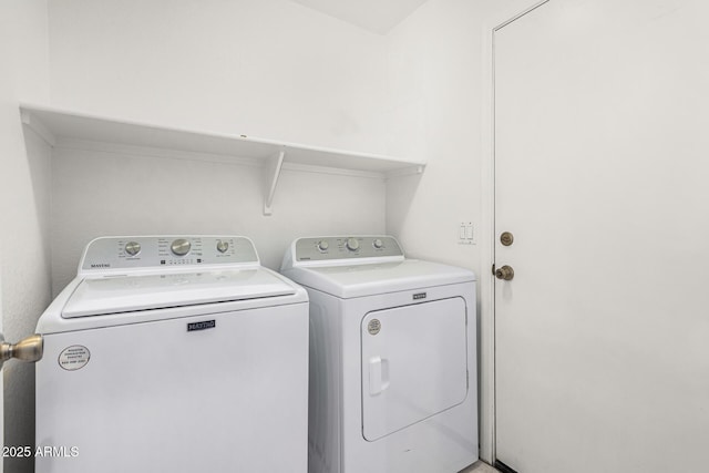 laundry area featuring separate washer and dryer