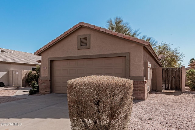 exterior space with a garage and an outdoor structure