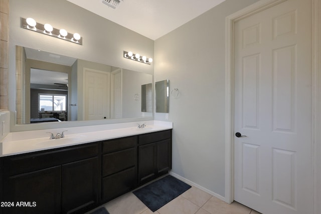 bathroom featuring vanity and tile patterned floors