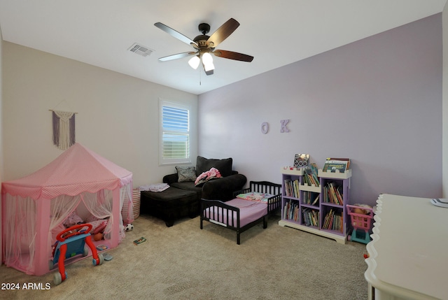 recreation room featuring ceiling fan and carpet