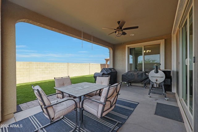 view of patio with grilling area and ceiling fan