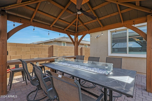 view of patio / terrace featuring a gazebo and ceiling fan