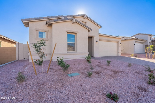 view of front of property with a garage