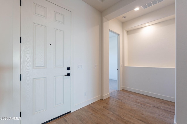 hall featuring light wood-type flooring