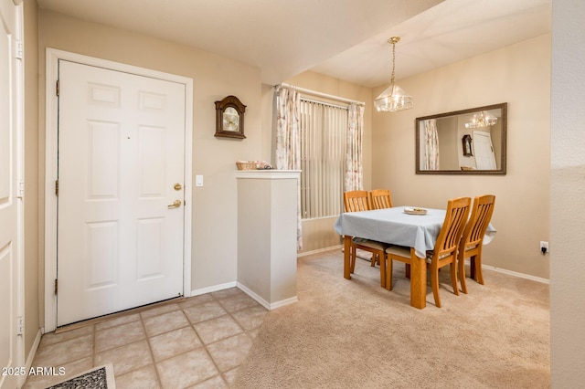 14950 W Mountain View Blvd Unit 5306, Surprise, AZ 85374 - carpeted dining space with a chandelier and baseboards