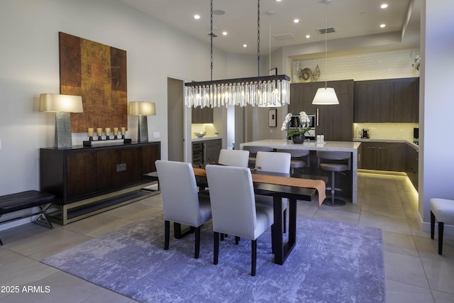 dining space with light tile patterned floors