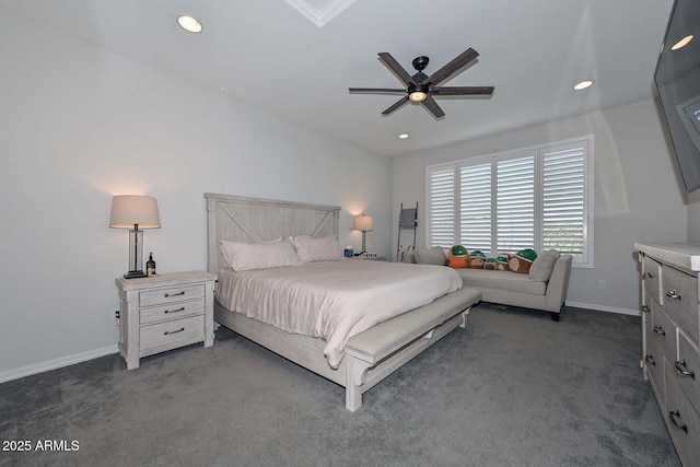 bedroom featuring ceiling fan and dark carpet