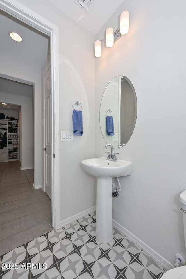 bathroom featuring toilet