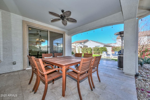 view of patio / terrace featuring ceiling fan