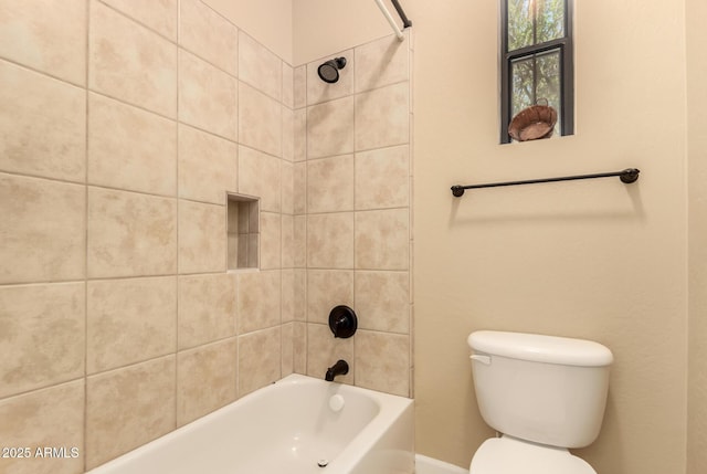 full bathroom featuring toilet and shower / washtub combination