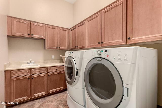 laundry area with washer and dryer and cabinet space